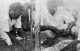 Yashvantrao (son) and Mukundrao (nephew) Ambedkar collecting ashes at Chaitya Bhoomi on 8 December 1956